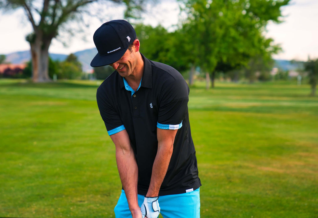 Black four-way stretch golf polo by BlowSnake